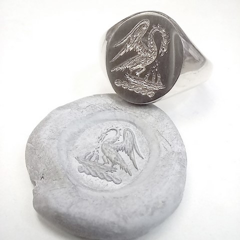 Heraldic pelican feeding chicks silver signet ring