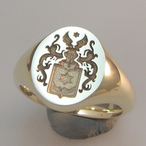 Trade coat of arms engraved silver signet rings