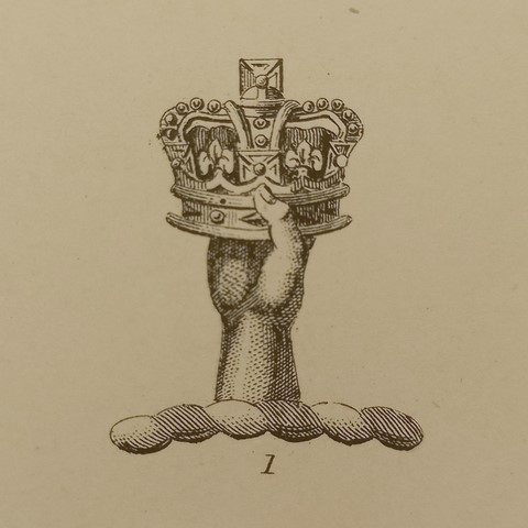 Hand holding crown crest trade engraving