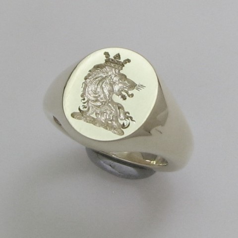 Demi lion with crown trade crest signet ring