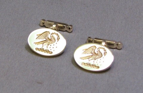 Crest engraved cufflinks, trade engraving service