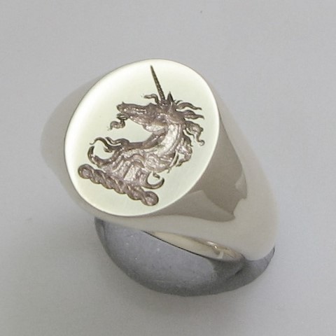 Trade crest engraved unicorn signet ring